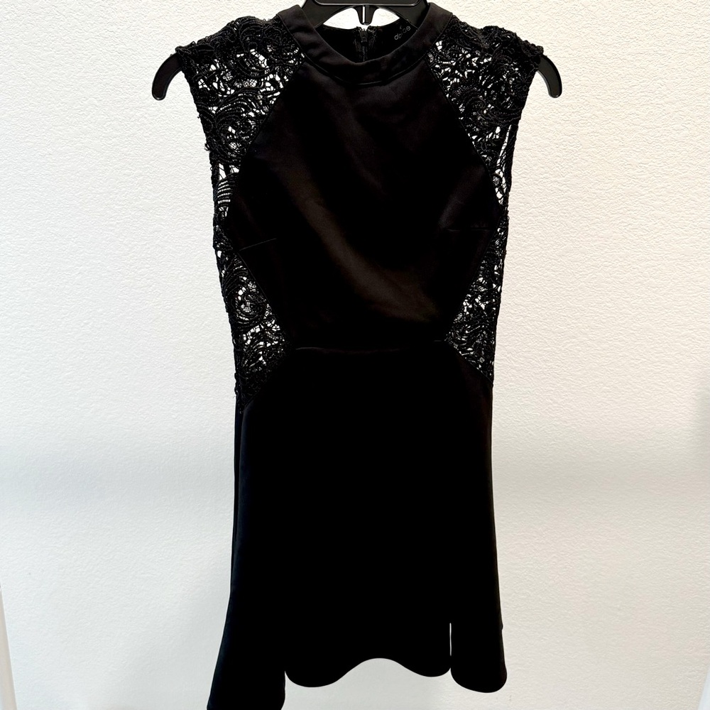 Black babydoll dress with lace.
